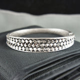 Silver filigree antique style bangle bracelet with crystals
